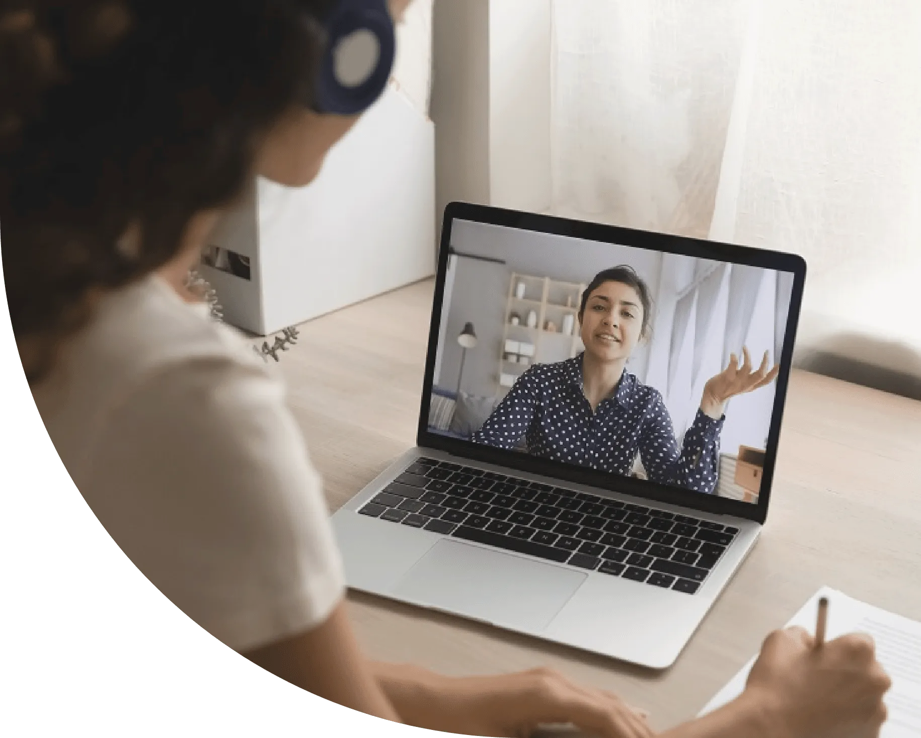 tutor teaching in front of laptop